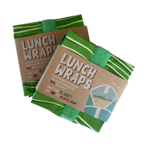 Two packs of eco friendly lunch wraps in green leaf print wrapped up with a cardboard sleeve.