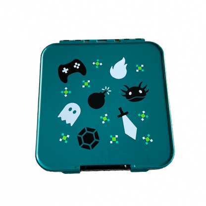 Teal green lunchbox with a black and white retro gamer print on the lid.