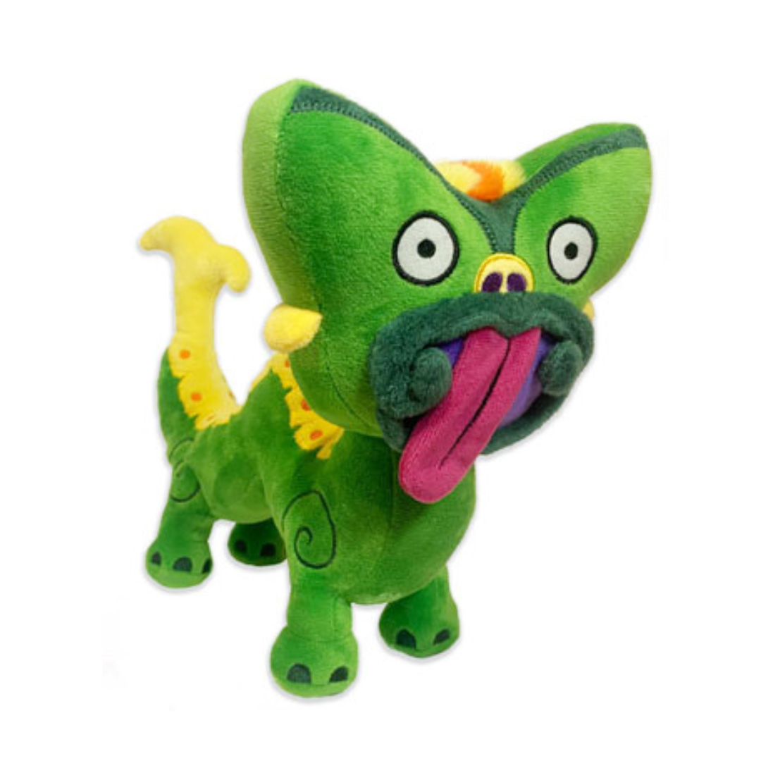 Bright green taniwha soft toy with yellow tail and bright pink tongue against a white background.