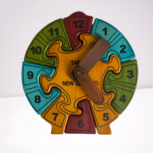 Childrens wooden clock puzzle in 4 different colours.